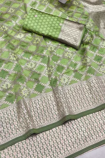 Light green zari woven silk blend saree with blouse piece