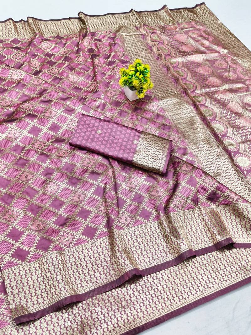 Magenta zari woven banarasi silk blend saree with blouse piece