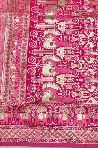 Pink zari woven silk blend saree with blouse piece