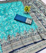 Light blue zari woven banarasi silk blend saree with blouse piece