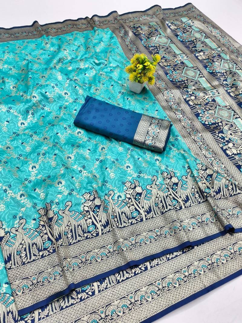 Light blue zari woven banarasi silk blend saree with blouse piece