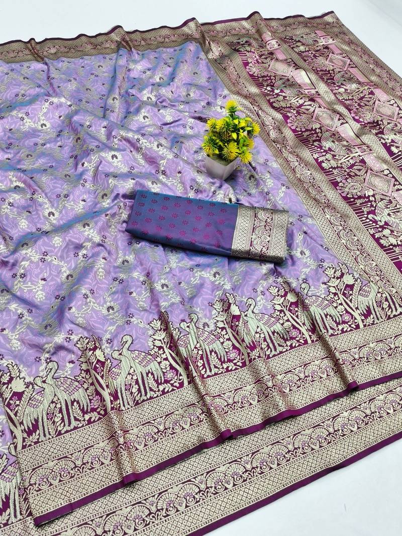 Light purple zari woven banarasi silk blend saree with blouse piece