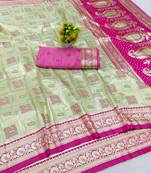 Light green zari woven banarasi silk blend saree with blouse piece