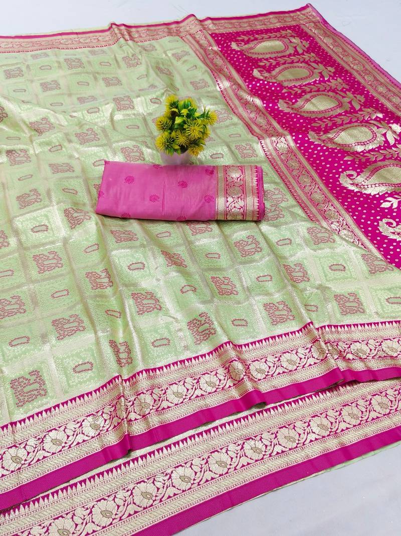 Light green zari woven banarasi silk blend saree with blouse piece