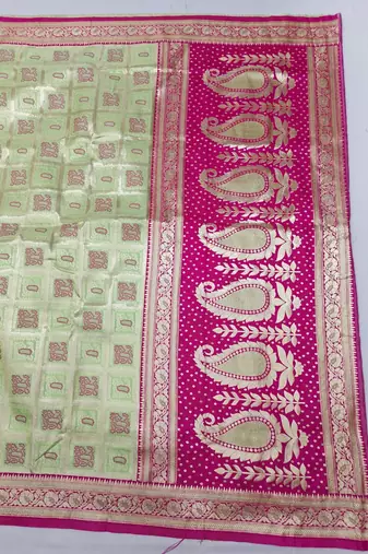 Light green zari woven silk blend saree with blouse piece