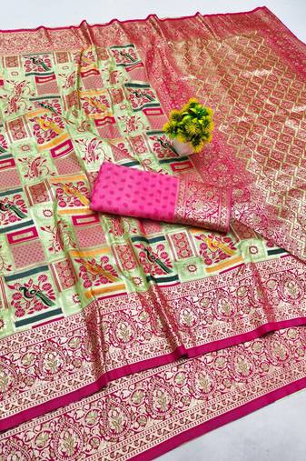 Light green zari woven patola silk blend saree with blouse piece