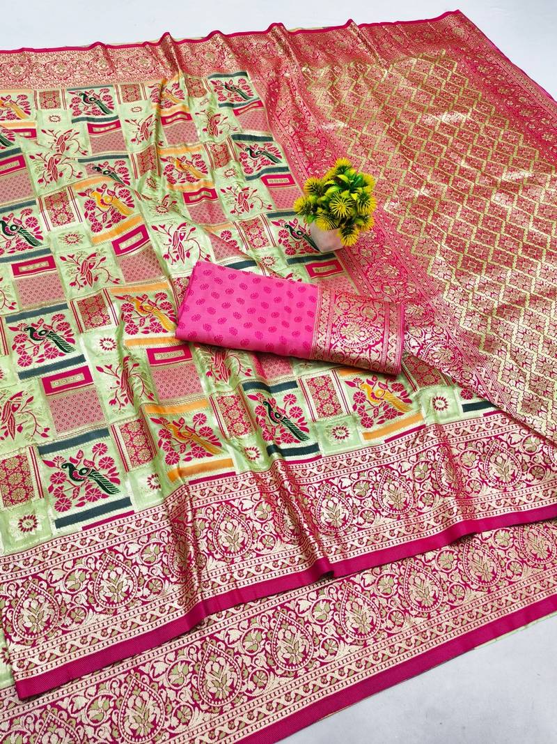 Light green zari woven patola silk blend saree with blouse piece