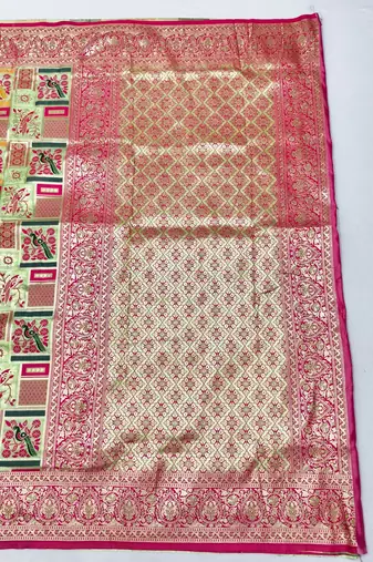 Light green zari woven patola silk blend saree with blouse piece