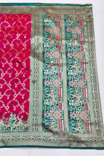Rani pink zari woven silk blend saree with blouse piece