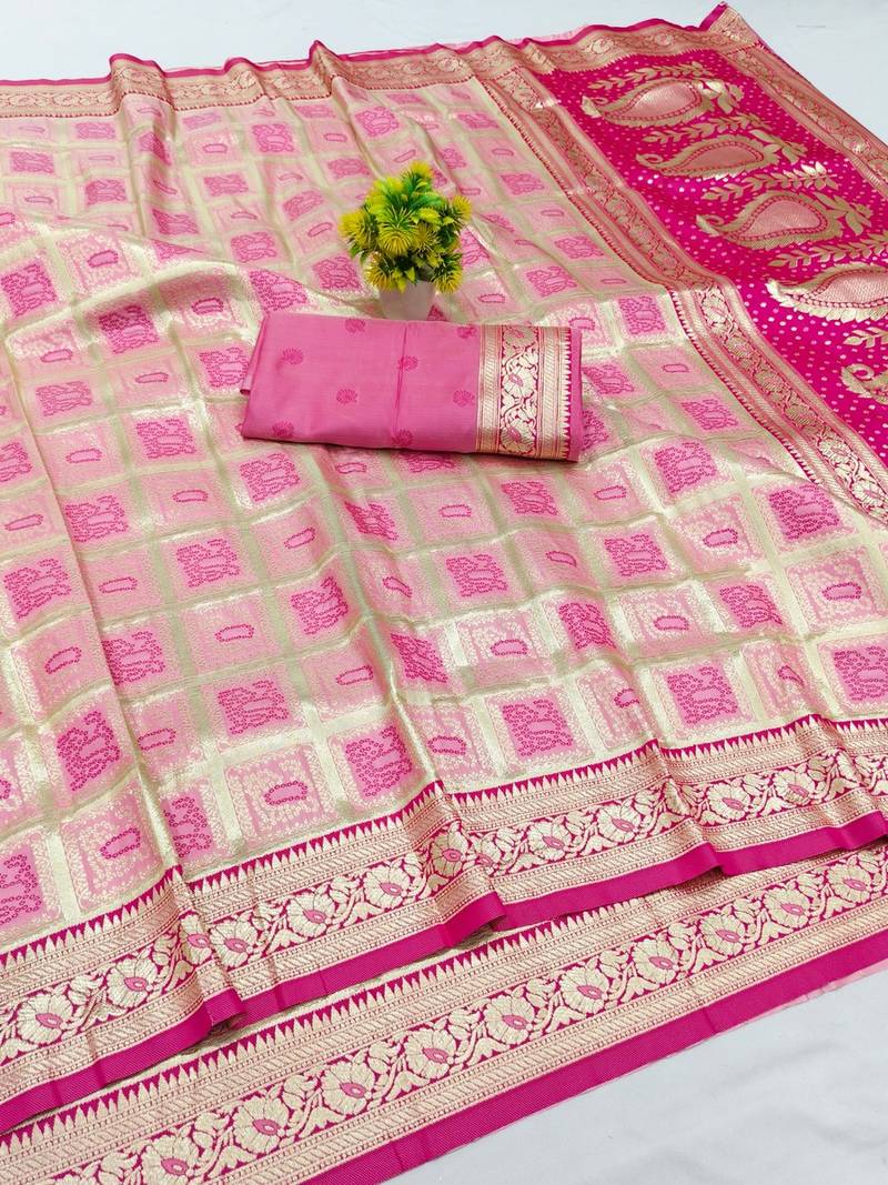 Pink zari woven banarasi silk blend saree with blouse piece