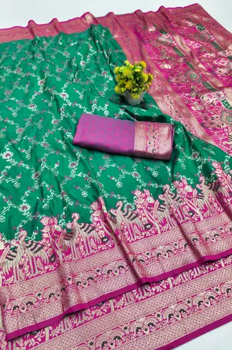 Green zari woven banarasi silk blend saree with blouse piece