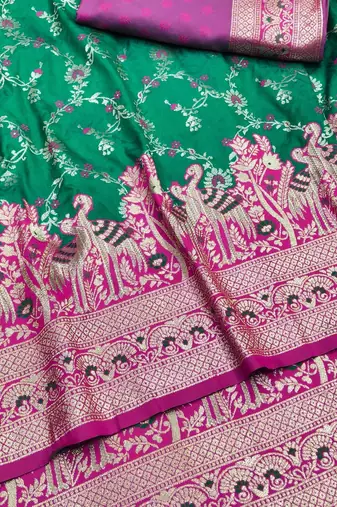 Green zari woven silk blend saree with blouse piece