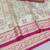 Cream zari woven banarasi silk blend saree with blouse piece