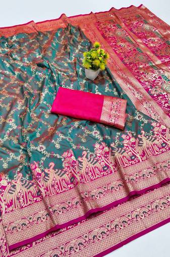 Tael green zari woven banarasi silk blend saree with blouse piece