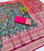 Tael green zari woven banarasi silk blend saree with blouse piece