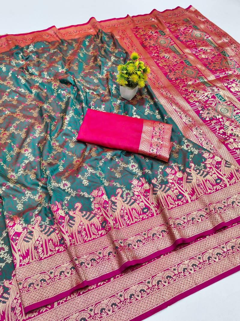 Tael green zari woven banarasi silk blend saree with blouse piece