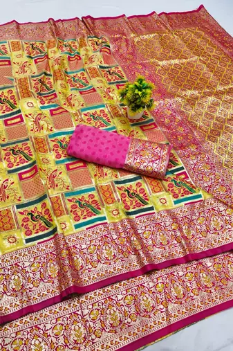 Gold zari woven patola silk blend saree with blouse piece