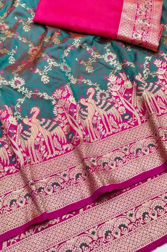 Tael green zari woven silk blend saree with blouse piece