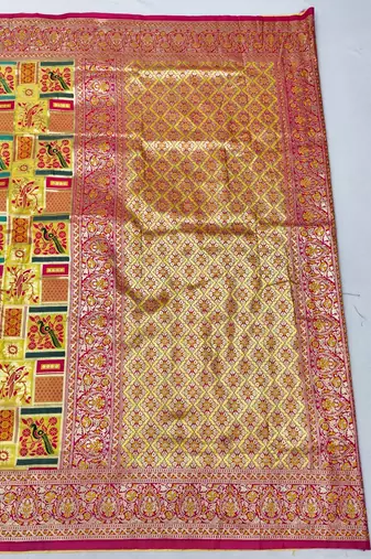 Gold zari woven patola silk blend saree with blouse piece