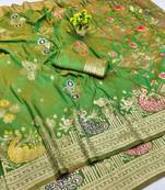 Green zari woven paithani silk blend saree with blouse piece