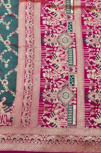 Tael green zari woven silk blend saree with blouse piece