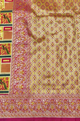 Gold zari woven patola silk blend saree with blouse piece