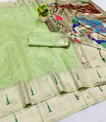 Light green zari woven paithani organza silk blend traditional saree with blouse piece