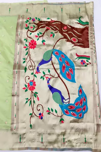 Light green zari woven paithani organza silk blend saree with blouse piece