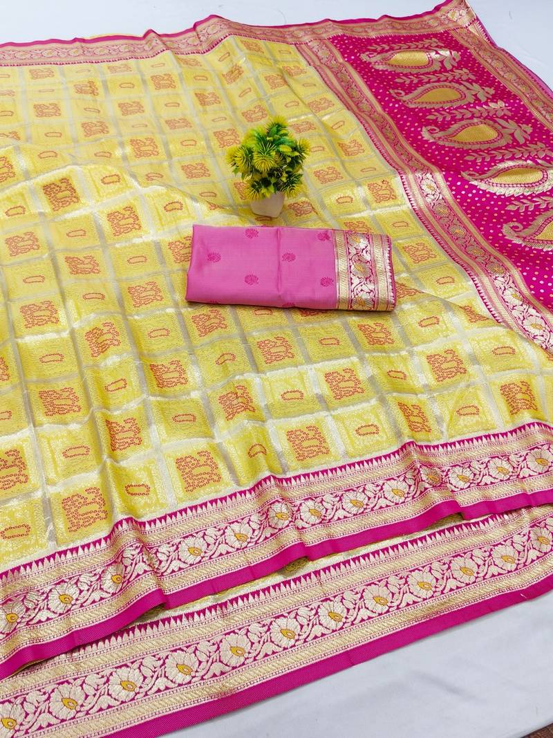 Yellow zari woven banarasi silk blend saree with blouse piece