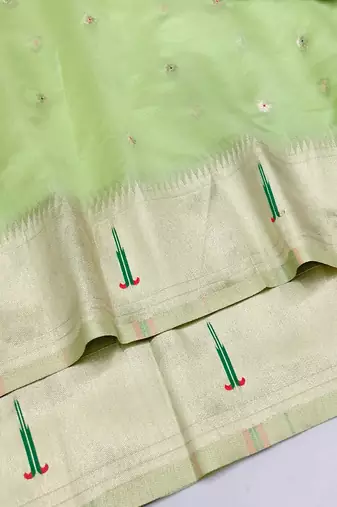 Light green zari woven paithani organza silk blend saree with blouse piece