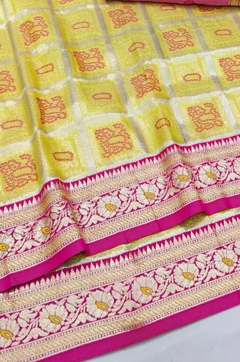 Yellow zari woven silk blend saree with blouse piece