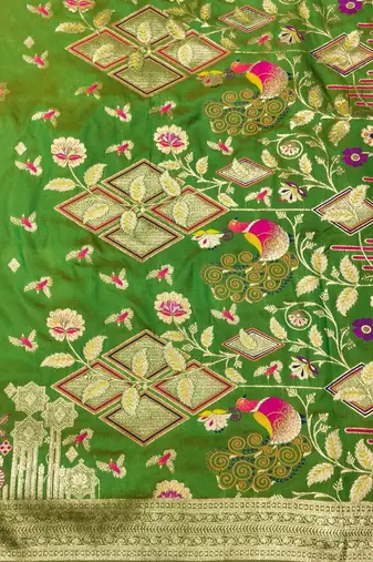 Green zari woven paithani silk blend saree with blouse piece