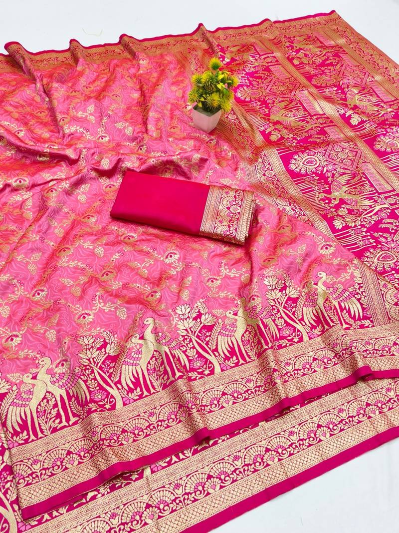 Pink zari woven banarasi silk blend saree with blouse piece
