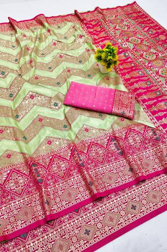 Light green zari woven banarasi silk blend saree with blouse piece