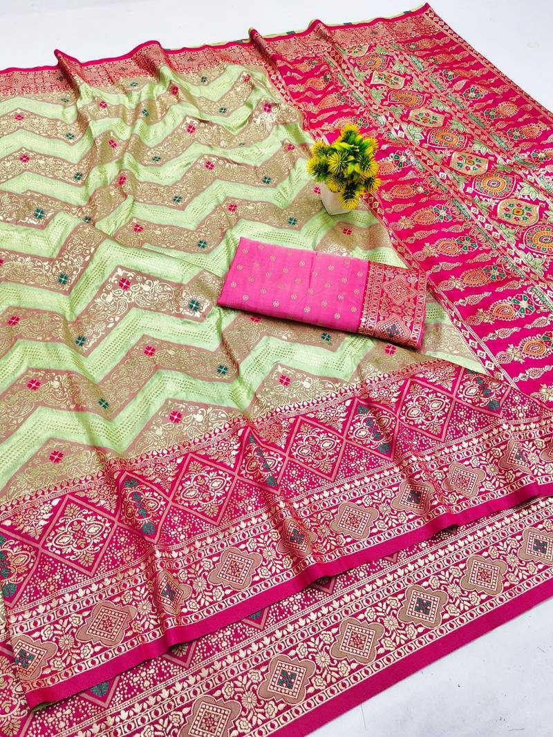 Light green zari woven banarasi silk blend saree with blouse piece