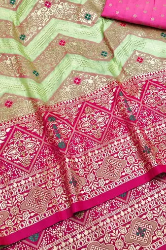 Light green zari woven silk blend saree with blouse piece