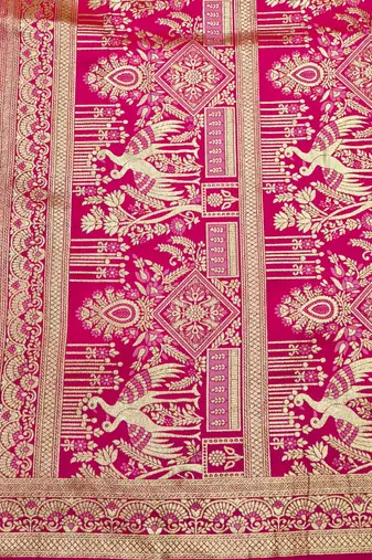 Pink zari woven silk blend saree with blouse piece