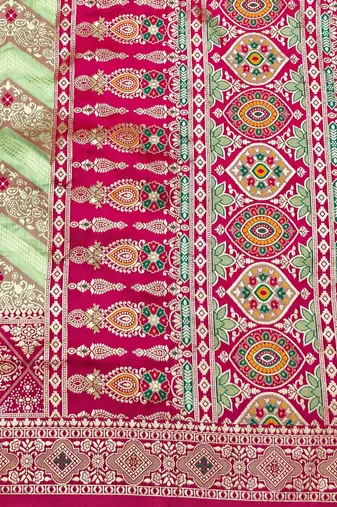 Light green zari woven silk blend saree with blouse piece