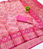 Pink zari woven banarasi silk blend saree with blouse piece