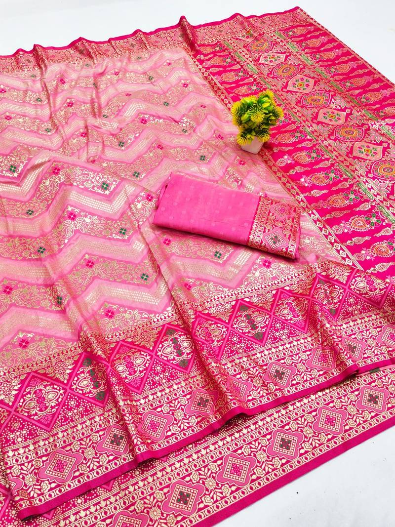 Pink zari woven banarasi silk blend saree with blouse piece