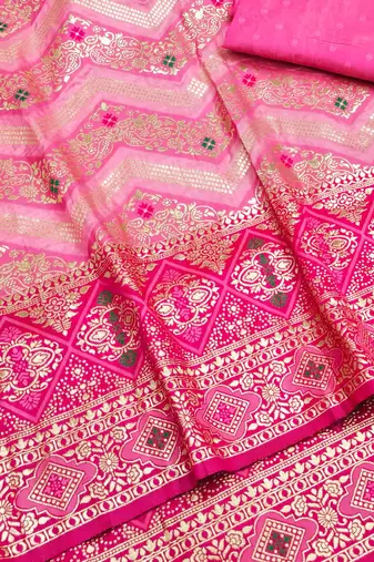 Pink zari woven silk blend saree with blouse piece