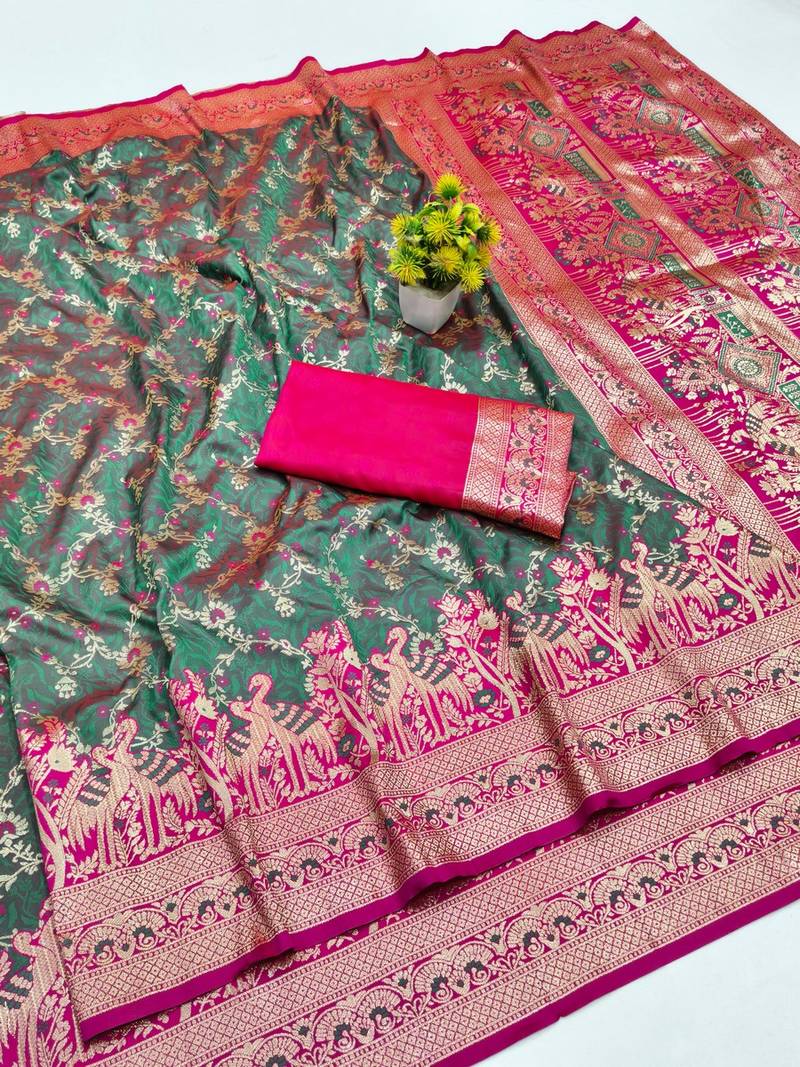 Sea green zari woven banarasi silk blend saree with blouse piece