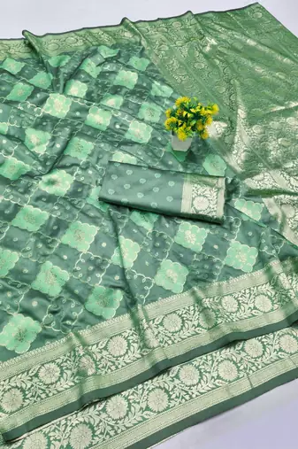 Sea green zari woven banarasi silk blend saree with blouse piece