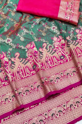 Sea green zari woven silk blend saree with blouse piece