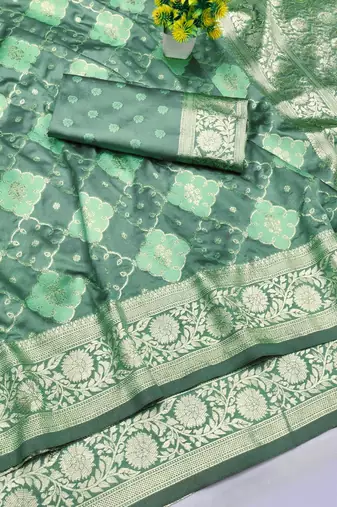 Sea green zari woven silk blend saree with blouse piece