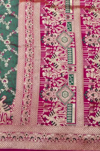 Sea green zari woven silk blend saree with blouse piece