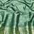 Sea green zari woven banarasi silk blend saree with blouse piece