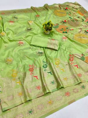 Light green zari woven silk blend saree with blouse piece 1