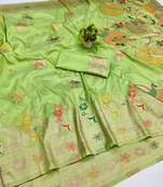Light green zari woven banarasi silk blend saree with blouse piece