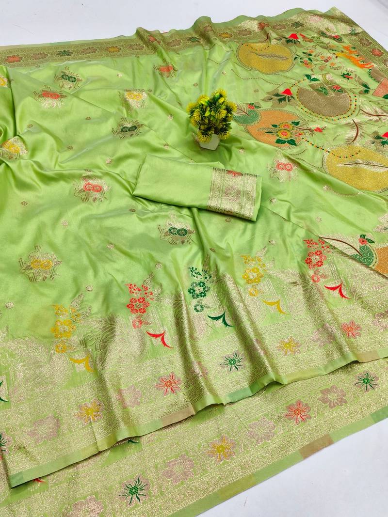 Light green zari woven banarasi silk blend saree with blouse piece